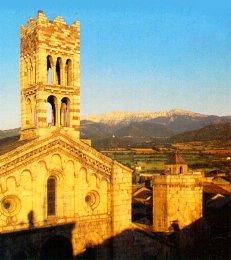 The Romànic Cathedral With The Cadí mountain at the bottom.